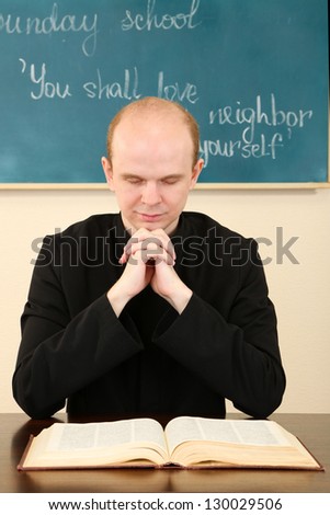 Priest in Sunday school