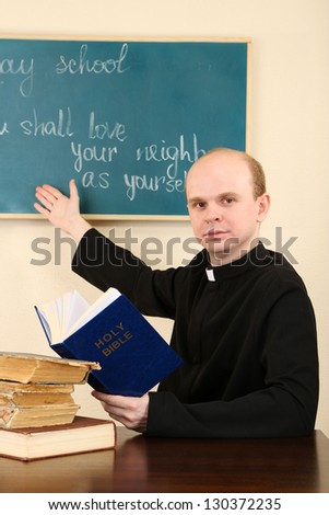 Priest in Sunday school