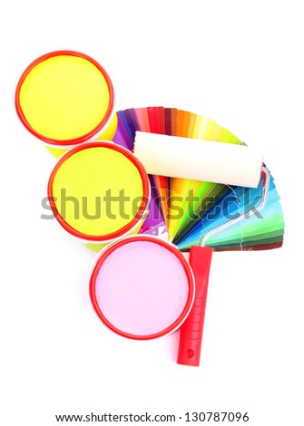 Set for painting: paint pots, paint-roller, palette of colors isolated on white