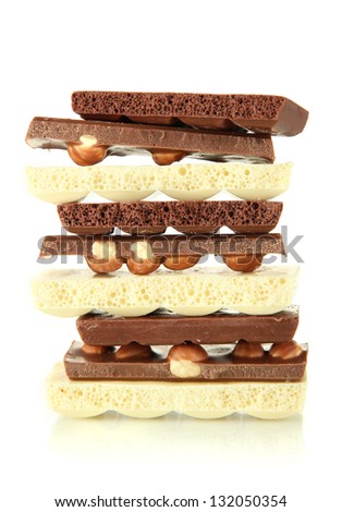Dark, white chocolate  and chocolate with nuts, isolated on white