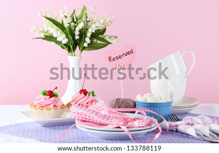 Tableware for tea drinking on bright background