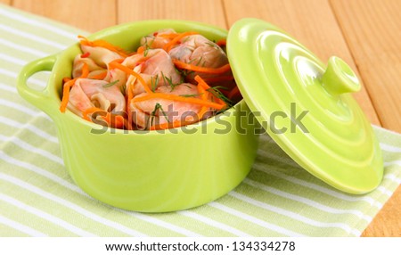 Stuffed cabbage rolls in pan on table