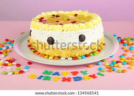 Happy birthday cake, on pink background