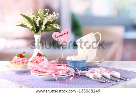 Tableware for tea drinking on bright background