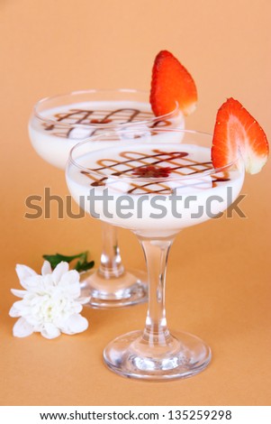 Fruit smoothies on brown background