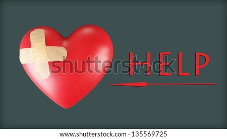 Heart with plaster, on color background