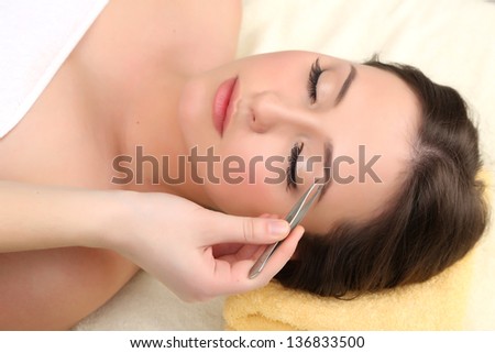 Beautiful Young Woman In Cosmetic Salon Close Up