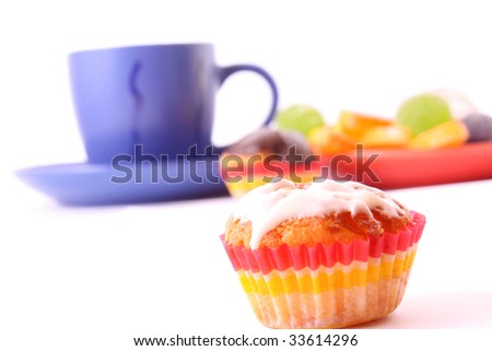 Coffee with milk color cup with cakes on white background