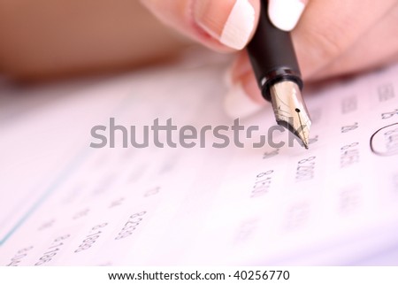 Pen in hand make some corrections in printed digits