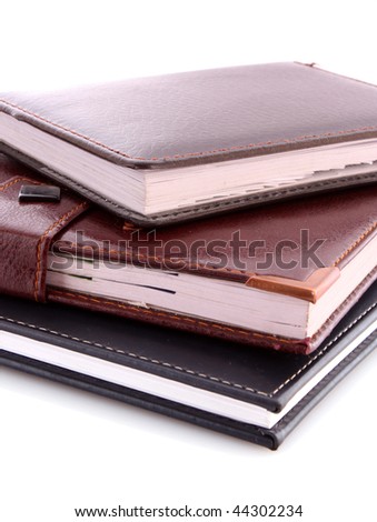 Leather notebooks on white background