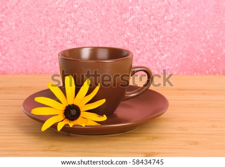 Cup of tea with flower