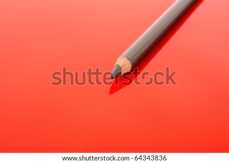 brown eyebrow pencil on red
