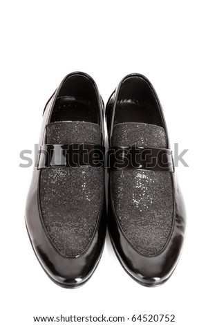 Black shiny man\'s shoe isolated on white