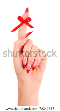 Nails with red nail polish and a bow on the finger