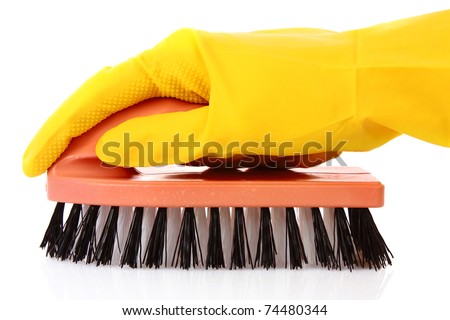 hand wearing a working glove and holding big sponge