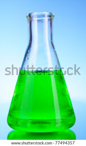 Conical flask on blue background