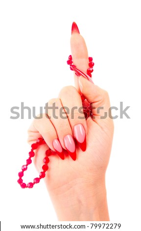 Nails with red nail polish and a bow on the finger