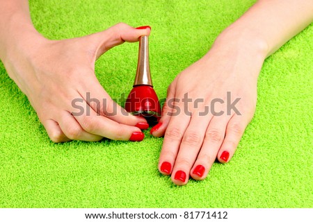 Beautiful hands with red manicure