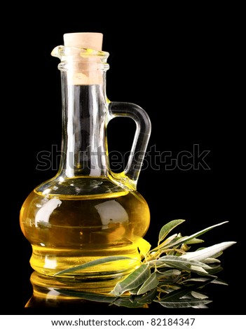olive oil in jar on black background