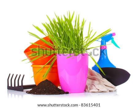 grass and garden tools isolated on white