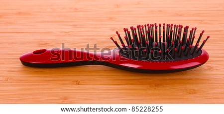 Hair Brush on brown background