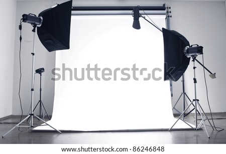 Empty photo studio with  lighting equipment