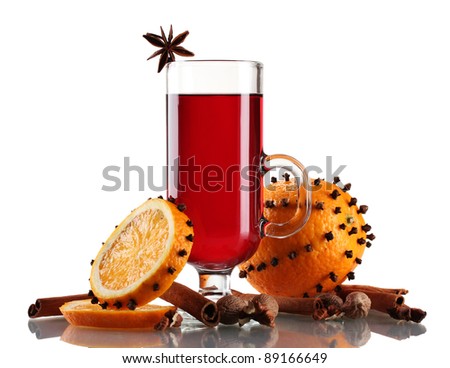 mulled wine in the glass, spice and orange isolated on white
