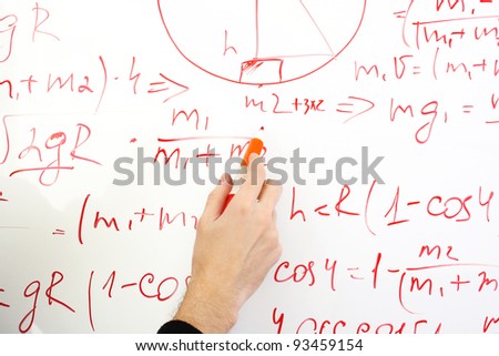 writing on the whiteboard formulas, closeup