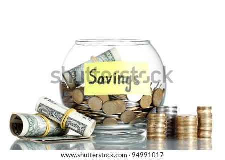 Clear glass jar for tips with money isolated on white. Ukrainian coins