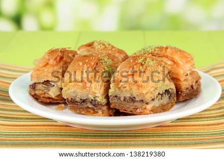 Sweet Baklava On Plate On Table On Bright Background