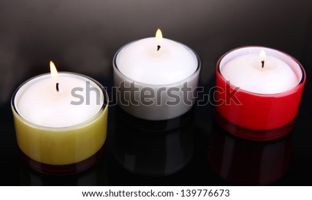 Candles isolated on black