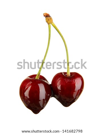 Ripe red cherry berries in chocolate isolated on white