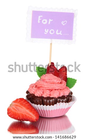 Beautiful strawberry cupcake with postcard isolated on white