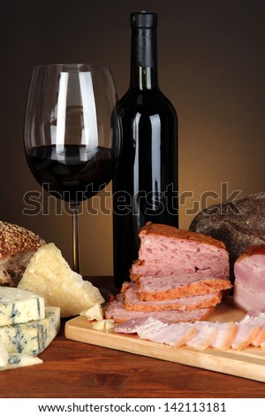 Exquisite still life of wine, cheese and meat products