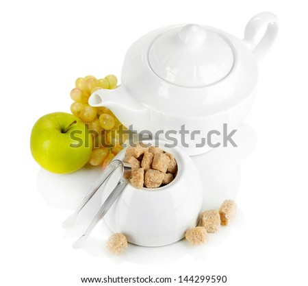 Unrefined sugar in white sugar bowl on grey background