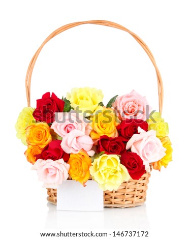 Beautiful bouquet of roses in wicker basket isolated on white