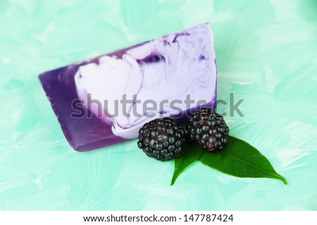 Piece of handmade soap, on bright background