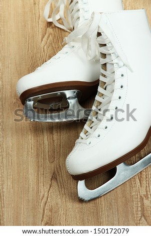 Figure skates on table close-up