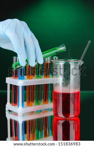 Laboratory glassware on dark color background