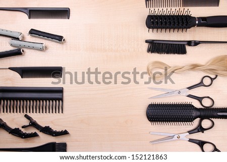 Professional hairdresser tools on table close-up