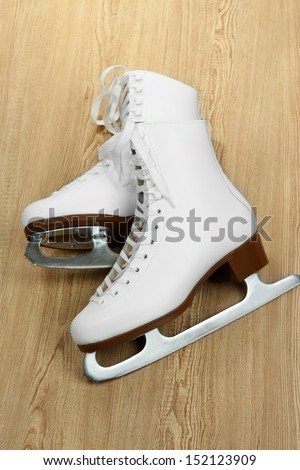 Figure skates on table close-up