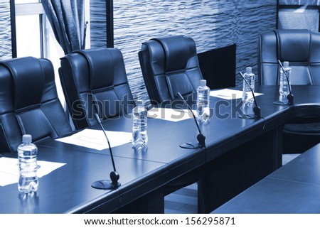 Meeting room in office center in shades of grey