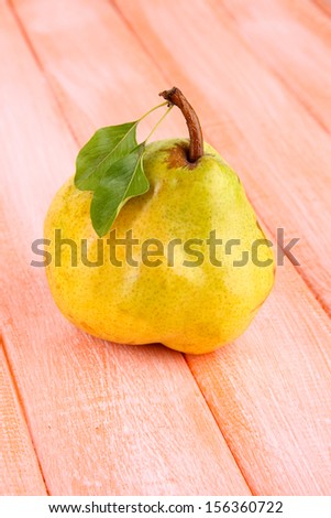 Juicy pear on table close-up