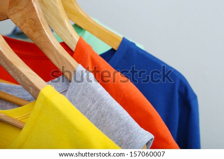 Clothes on circle hanger on light background