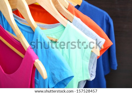 Clothes on circle hanger on dark background