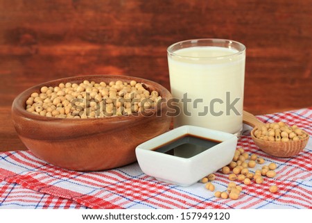 Soy products on table on wooden background