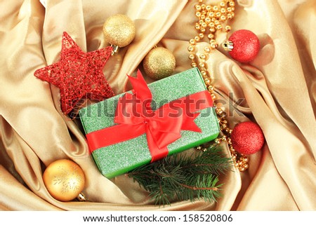 Beautiful bright gift and christmas decor, on silk cloth