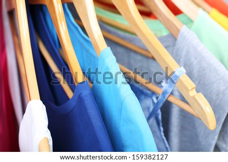 Clothes on circle hanger on light background