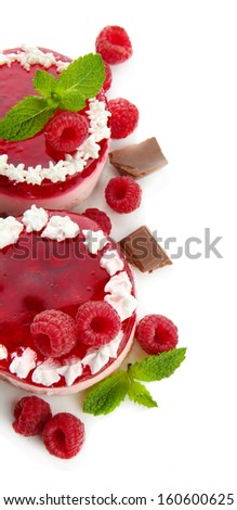 Delicious berry cakes isolated on white