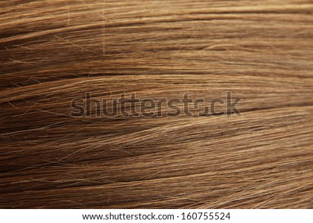 Shiny brown hair close-up background